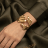 Camélia — Gold Textured Flower Bracelet worn on wrist