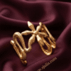 Serpentine — Gold Coiled Snake Cuff Bracelet worn on wrist