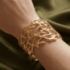 Ramure — Gold Branch Cutout Cuff Bracelet worn on wrist Ramure — Gold Branch Cutout Cuff Bracelet worn on wrist