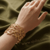 Ramure — Gold Branch Cutout Cuff Bracelet worn on wrist Ramure — Gold Branch Cutout Cuff Bracelet worn on wrist