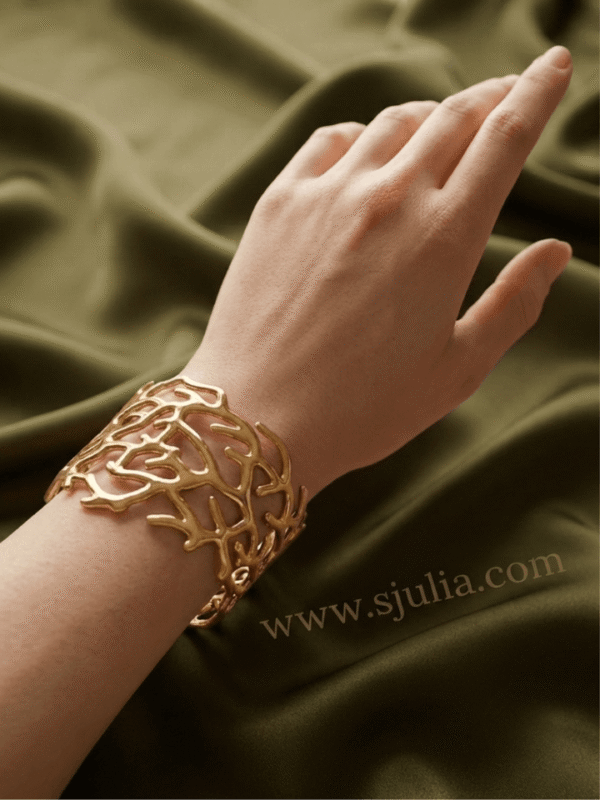 Ramure — Gold Branch Cutout Cuff Bracelet worn on wrist Ramure — Gold Branch Cutout Cuff Bracelet worn on wrist