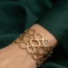 Cercle — Gold Ring Link Cuff Bracelet worn on wrist
