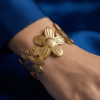 Camélia — Gold Textured Flower Bracelet worn on wrist