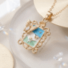 Zarnigar – Gold Butterfly Enamel Landscape Pendant Necklace Zarnigar – Gold Butterfly Enamel Landscape Pendant Necklace