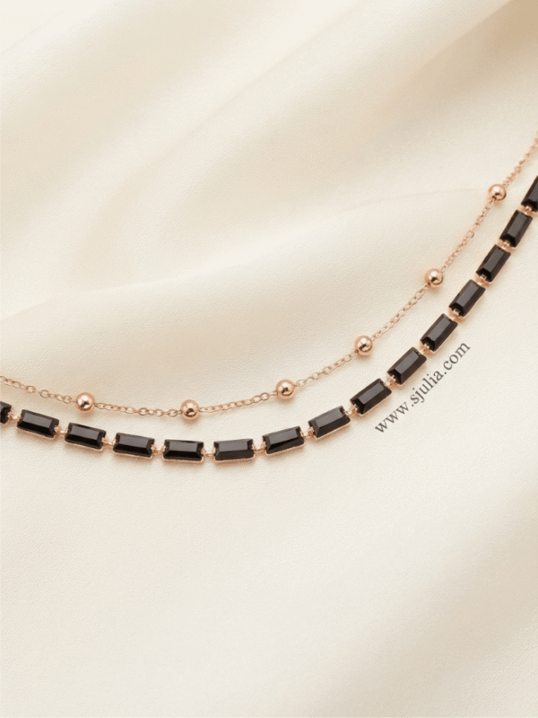 1 Aqs — Gold and Balck Beaded Anklet