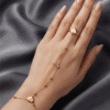 Adora — Gold Heart Crystal Hand Chain worn on hand Adora — Gold Heart Crystal Hand Chain worn on hand