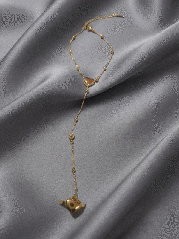 Adora — Gold Heart Crystal Hand Chain worn on hand Adora — Gold Heart Crystal Hand Chain worn on hand