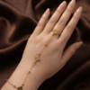 Fleur — Gold Flower Charm Hand Chain worn on hand Fleur — Gold Flower Charm Hand Chain worn on hand