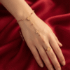Flocon — Rose Gold Snowflake Hand Chain worn on hand Flocon — Rose Gold Snowflake Hand Chain worn on hand