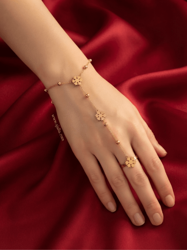 Flocon — Rose Gold Snowflake Hand Chain worn on hand Flocon — Rose Gold Snowflake Hand Chain worn on hand