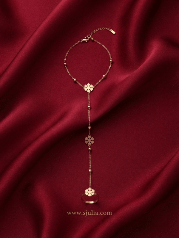 Flocon — Rose Gold Snowflake Hand Chain worn on hand Flocon — Rose Gold Snowflake Hand Chain worn on hand