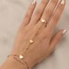 Amora — Gold Heart Charm Hand Chain worn on hand Amora — Gold Heart Charm Hand Chain worn on hand