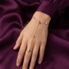 Astra — Gold Star Charm Hand Chain worn on hand Astra — Gold Star Charm Hand Chain worn on hand