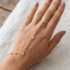Hand chain by sjuliaAstra — Gold Star Charm Hand Chain worn on hand Astra — Gold Star Charm Hand Chain worn on hand