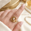 Husna Bano – Gold Swirl Solitaire Ring Husna Bano – Gold Swirl Solitaire Ring