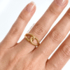 Dilfareb – Gold Interlocking Loop Ring Dilfareb – Gold Interlocking Loop Ring