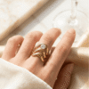 Husn-e-Bahar – Gold Wave Layered Solitaire Ring Husn-e-Bahar – Gold Wave Layered Solitaire Ring