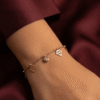 Diamant — Rose Gold Diamond Charm Bracelet worn on wrist Diamant — Rose Gold Diamond Charm Bracelet worn on wrist