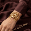 Corail — Gold Starfish Shell Cuff Bracelet worn on wrist Corail — Gold Starfish Shell Cuff Bracelet worn on wrist