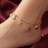 Sahil – Gold Ocean Charm Anklet worn on ankle Sahil – Gold Ocean Charm Anklet worn on ankle