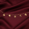 Sahil – Gold Ocean Charm Anklet worn on ankle Sahil – Gold Ocean Charm Anklet worn on ankle