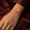 Diamant — Rose Gold Diamond Charm Bracelet worn on wrist Diamant — Rose Gold Diamond Charm Bracelet worn on wrist