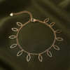 Zaitoon – Rose Gold Leaf Outline Anklet worn on ankle