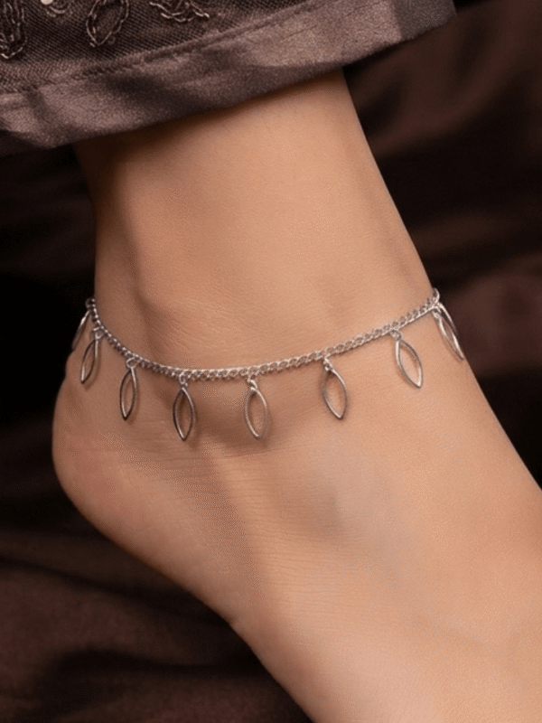 Chandi Zaitoon – Silver Leaf Outline Anklet worn on ankle Chandi Zaitoon – Silver Leaf Outline Anklet worn on ankle