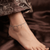 Chandi Zaitoon – Silver Leaf Outline Anklet worn on ankle Chandi Zaitoon – Silver Leaf Outline Anklet worn on ankle