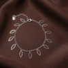 Chandi Zaitoon – Silver Leaf Outline Anklet worn on ankle Chandi Zaitoon – Silver Leaf Outline Anklet worn on ankle