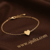 Dil — Gold Heart Charm Bracelet worn on wrist Dil — Gold Heart Charm Bracelet worn on wrist