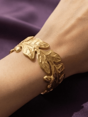Chêne — Gold Oak Leaf Acorn Cuff Bracelet worn on wrist Chêne — Gold Oak Leaf Acorn Cuff Bracelet worn on wrist