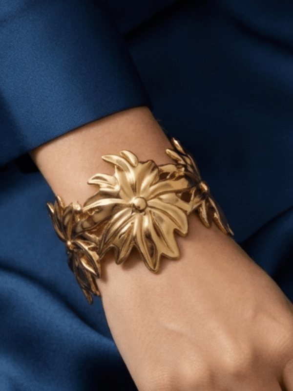 Aster — Gold Swirl Petal Cuff Bracelet worn on wrist Aster — Gold Swirl Petal Cuff Bracelet worn on wrist