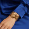 Aster — Gold Swirl Petal Cuff Bracelet worn on wrist Aster — Gold Swirl Petal Cuff Bracelet worn on wrist