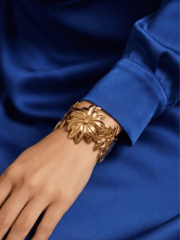 Aster — Gold Swirl Petal Cuff Bracelet worn on wrist Aster — Gold Swirl Petal Cuff Bracelet worn on wrist