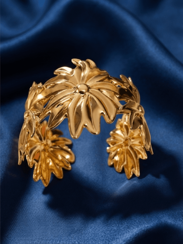 Aster — Gold Swirl Petal Cuff Bracelet worn on wrist Aster — Gold Swirl Petal Cuff Bracelet worn on wrist