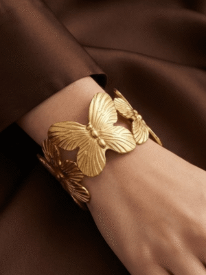 Papillon — Gold Butterfly Cuff Bracelet worn on wrist Papillon — Gold Butterfly Cuff Bracelet worn on wrist