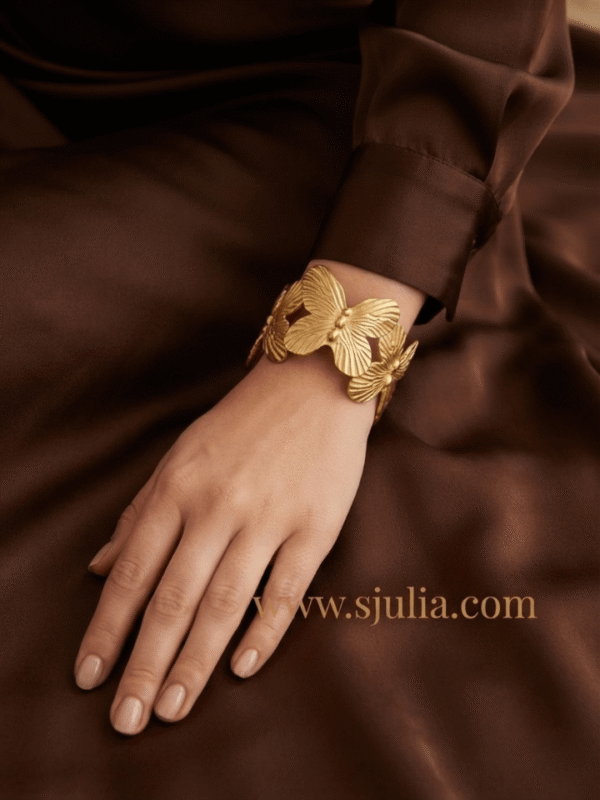 Papillon — Gold Butterfly Cuff Bracelet worn on wrist Papillon — Gold Butterfly Cuff Bracelet worn on wrist