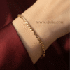 Zanjeer — Gold Herringbone Chain Bracelet worn on wrist Zanjeer — Gold Herringbone Chain Bracelet worn on wrist