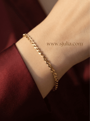 Zanjeer — Gold Herringbone Chain Bracelet worn on wrist Zanjeer — Gold Herringbone Chain Bracelet worn on wrist