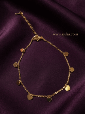 Dilruba — Gold Dangling Heart Charm Chain flat lay Dilruba — Gold Dangling Heart Charm Chain flat lay