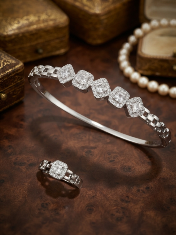 Silver bangle with square halo crystals and matching ring. Tarnish-free, statement fit. Free COD in Pakistan. Order online today! Silver bangle with square halo crystals and matching ring. Tarnish-free, statement fit. Free COD in Pakistan. Order online today!