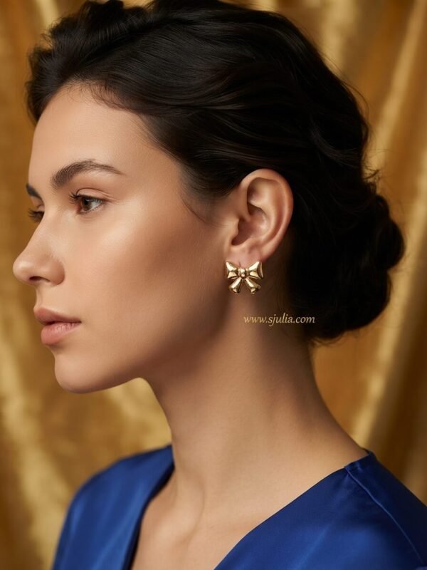 Rivaa – Textured Gold Bow Stud Earrings Rivaa – Textured Gold Bow Stud Earrings