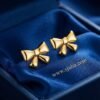Rivaa – Textured Gold Bow Stud Earrings Rivaa – Textured Gold Bow Stud Earrings