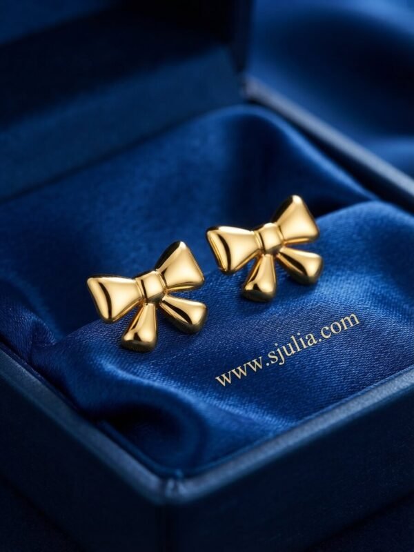 Rivaa – Textured Gold Bow Stud Earrings Rivaa – Textured Gold Bow Stud Earrings