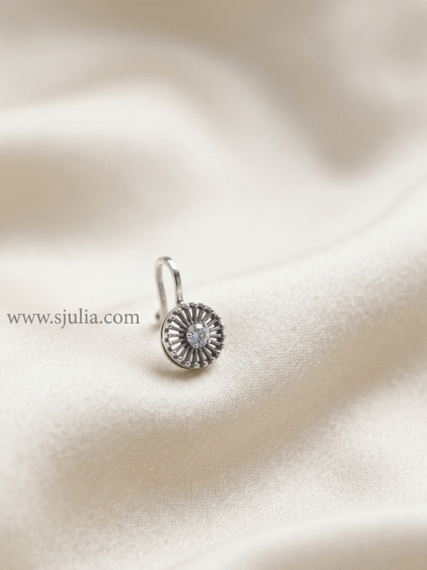 Kavya – Oxidised Silver Sunburst Nose Ring Kavya – Oxidised Silver Sunburst Nose Ring