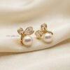 Elani – Gold Pearl Leaf Studs Elani – Gold Pearl Leaf Studs