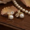Elani – Gold Pearl Leaf Studs Elani – Gold Pearl Leaf Studs
