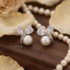 Elani – Gold Pearl Leaf Studs Elani – Gold Pearl Leaf Studs
