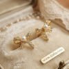 Farida – Gold Pearl Lace Bow Studs Farida – Gold Pearl Lace Bow Studs